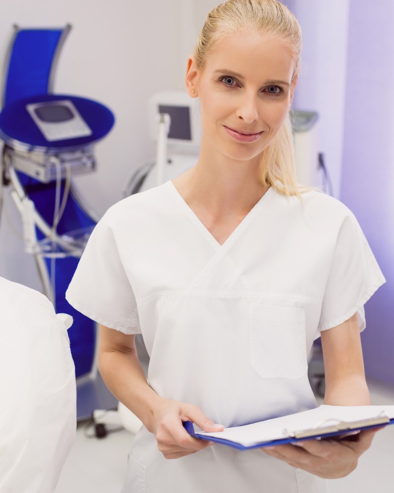 female-doctor-holding-reports-clinic-1.jpg